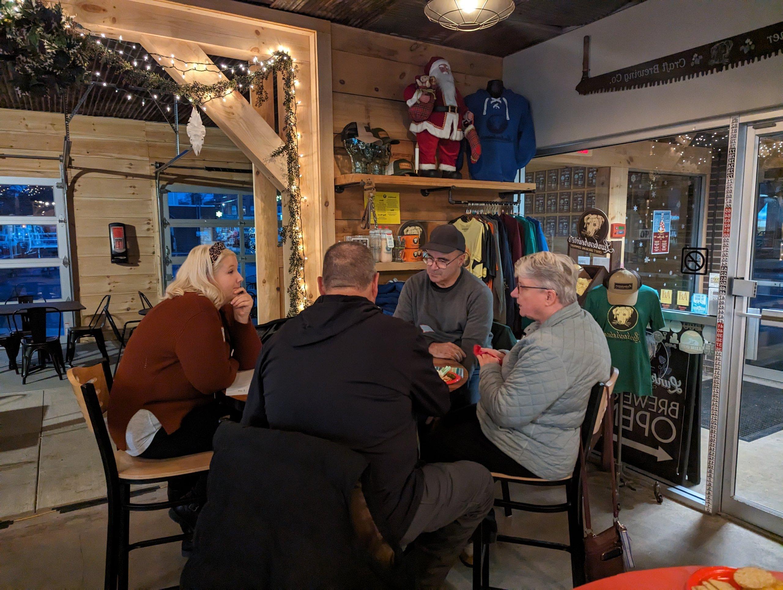 group or tourism partners sitting around a table in discussion